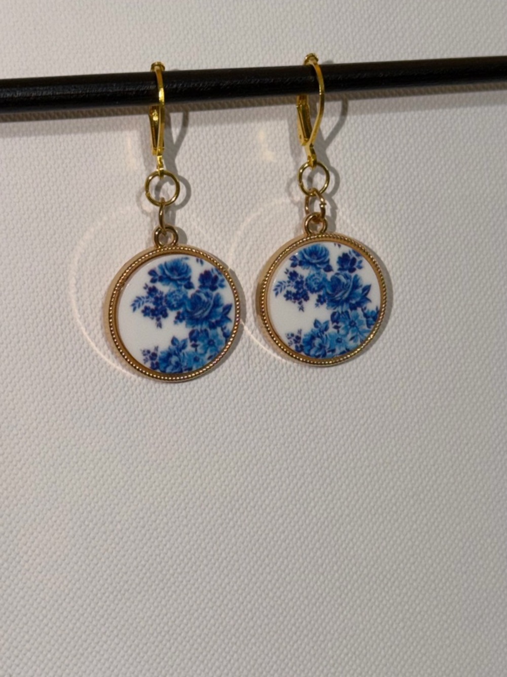 Handmade Gold-Tone Drop Earrings with Blue Floral Medallions